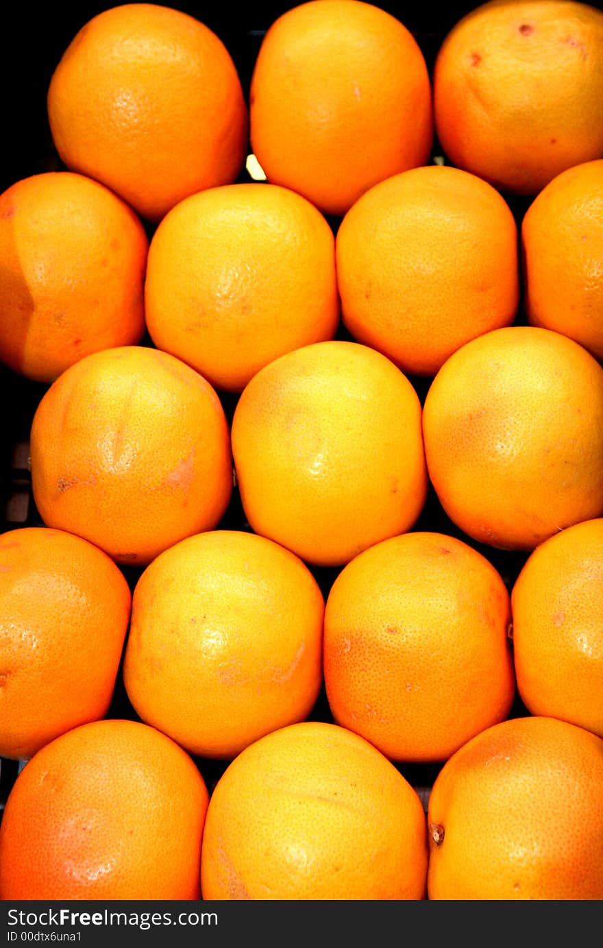 Pile of fresh oranges in a fruitshop