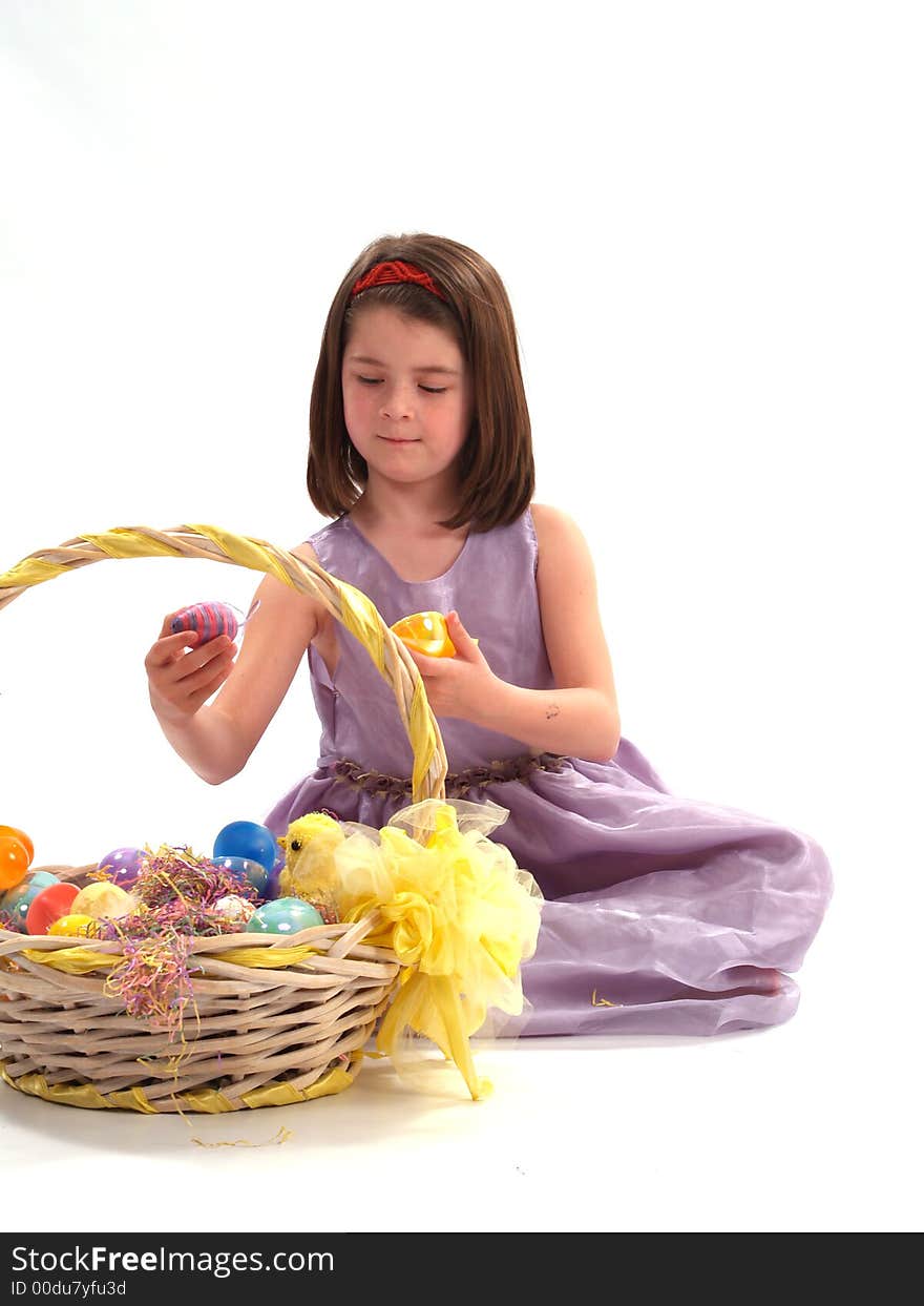 Young girl with an Easter Basket on white. Young girl with an Easter Basket on white