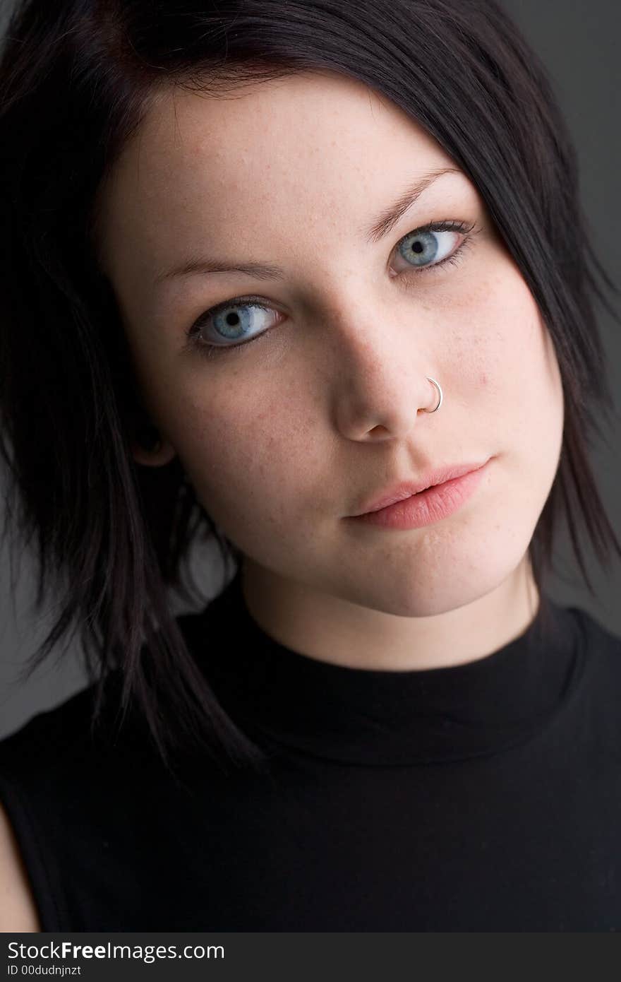 Portrait of a young woman with dark hair. Portrait of a young woman with dark hair