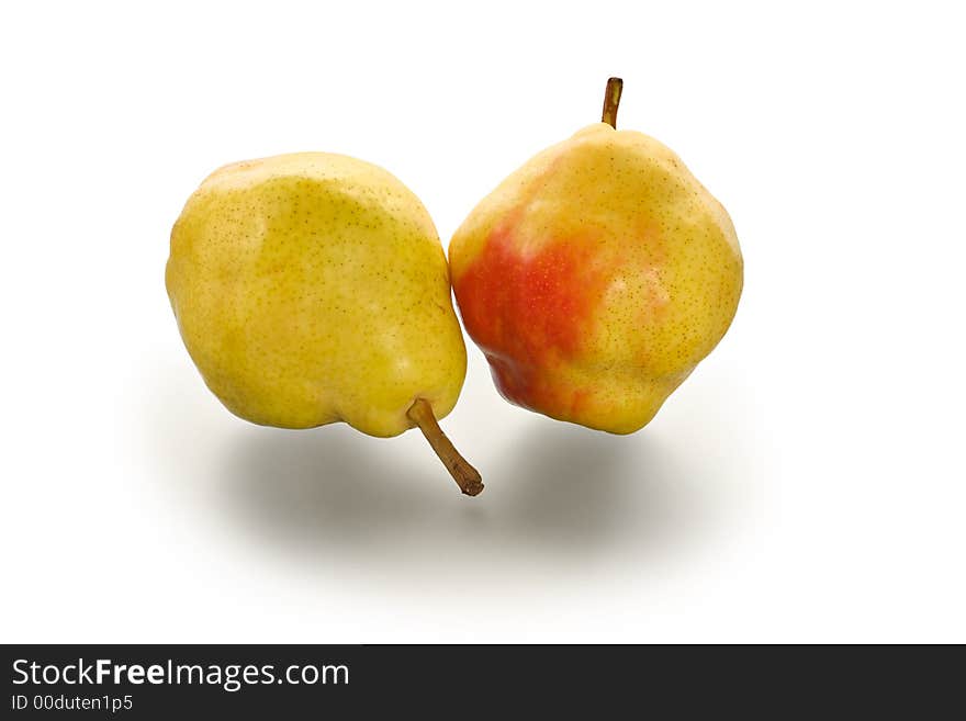 Two ripe Chinese pears on a glass table with reflection. Two ripe Chinese pears on a glass table with reflection