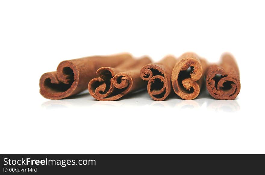 Pices of cinnamon on white backgrund