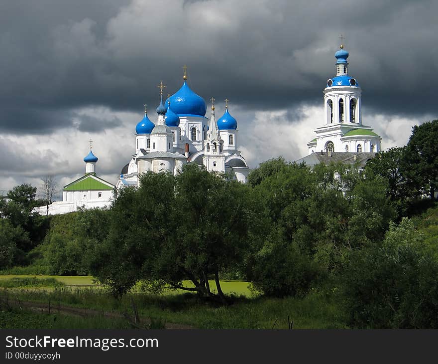 Summer view of tunderstorm over Temple in nunnery. (Bogolyubovo, Vladimir region, Golden Ring of Russia). Summer view of tunderstorm over Temple in nunnery. (Bogolyubovo, Vladimir region, Golden Ring of Russia).