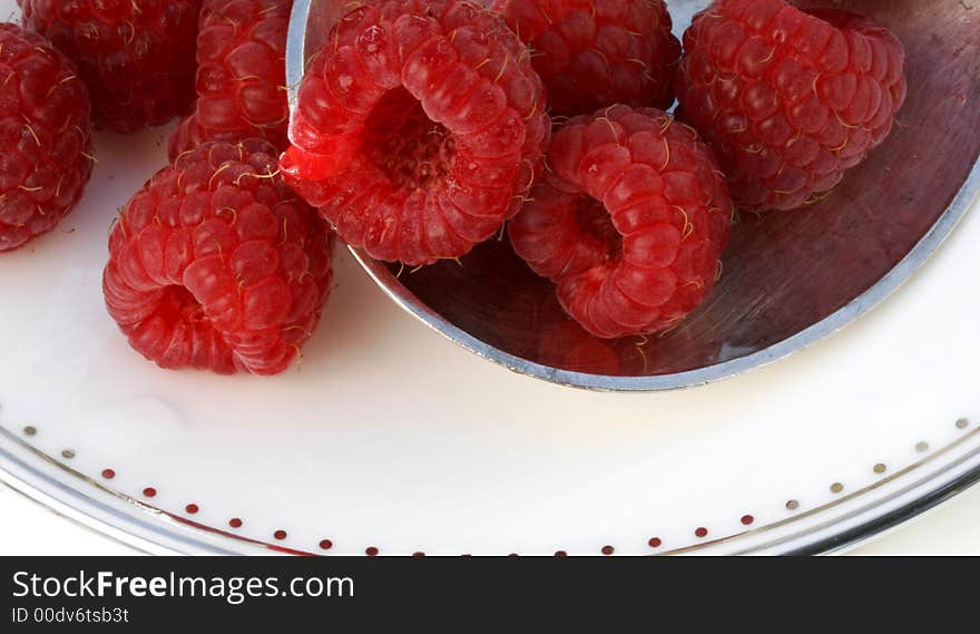 Ripe Raspberries on a Plate