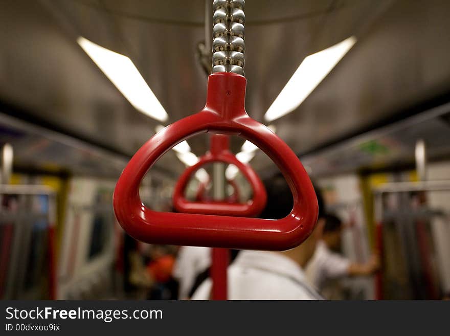 Handles in a subway train in Hong Kong. Handles in a subway train in Hong Kong