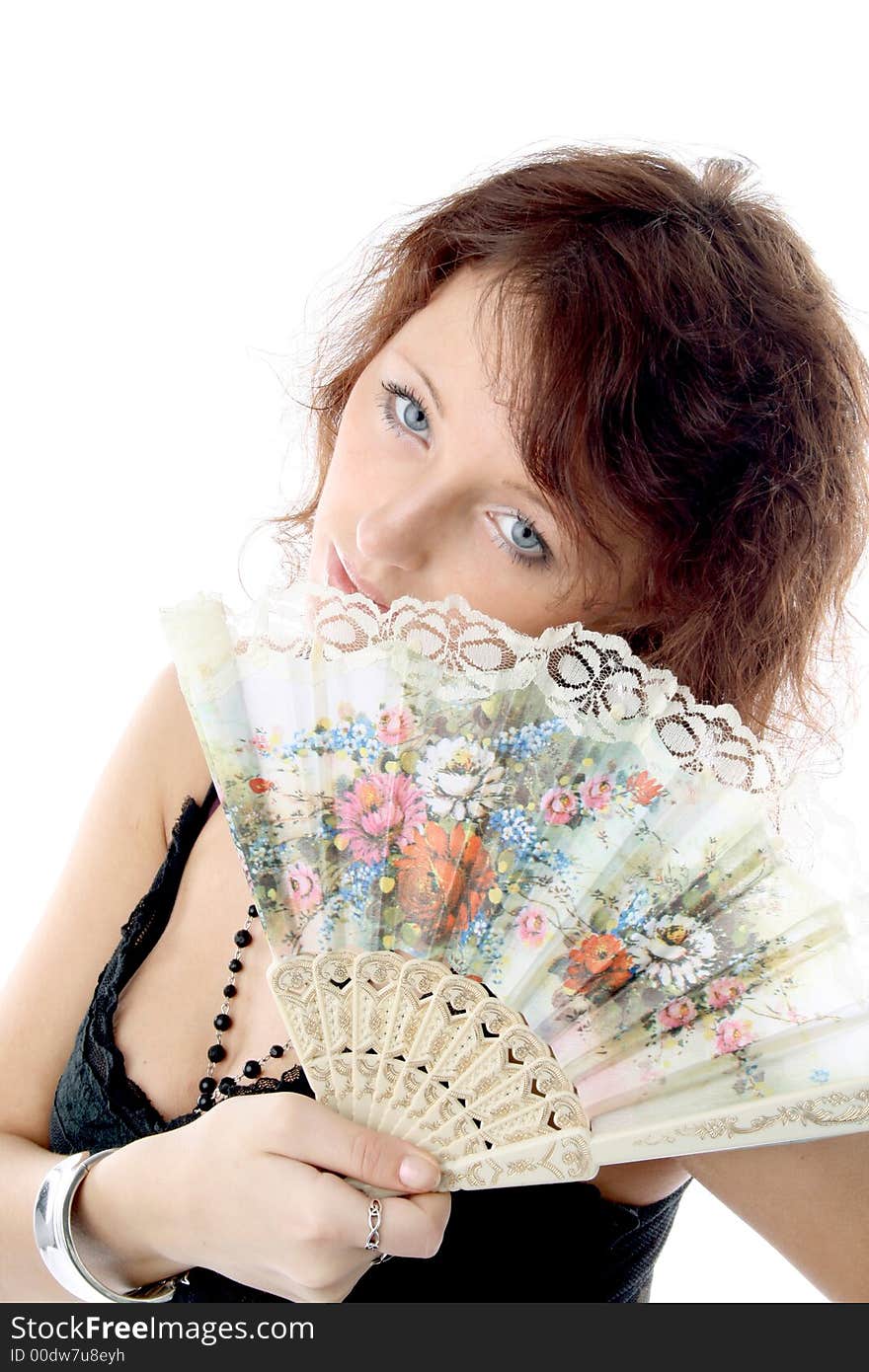 The girl with a fan on a white background