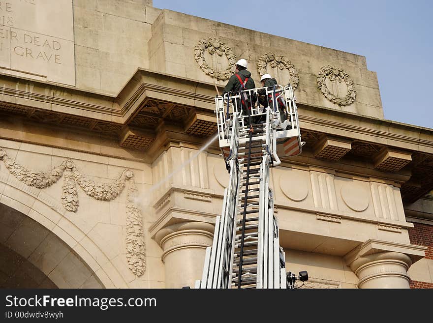 Workers Power Hosing the Menin Gate Memorial in Ieper, Belgium. Workers Power Hosing the Menin Gate Memorial in Ieper, Belgium