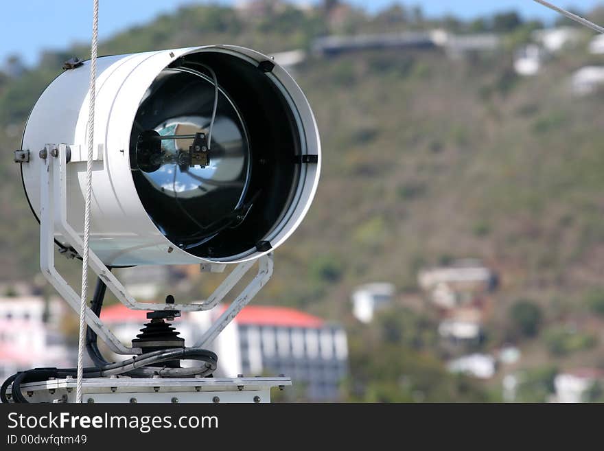 Search light attached to the side of a ship. Search light attached to the side of a ship