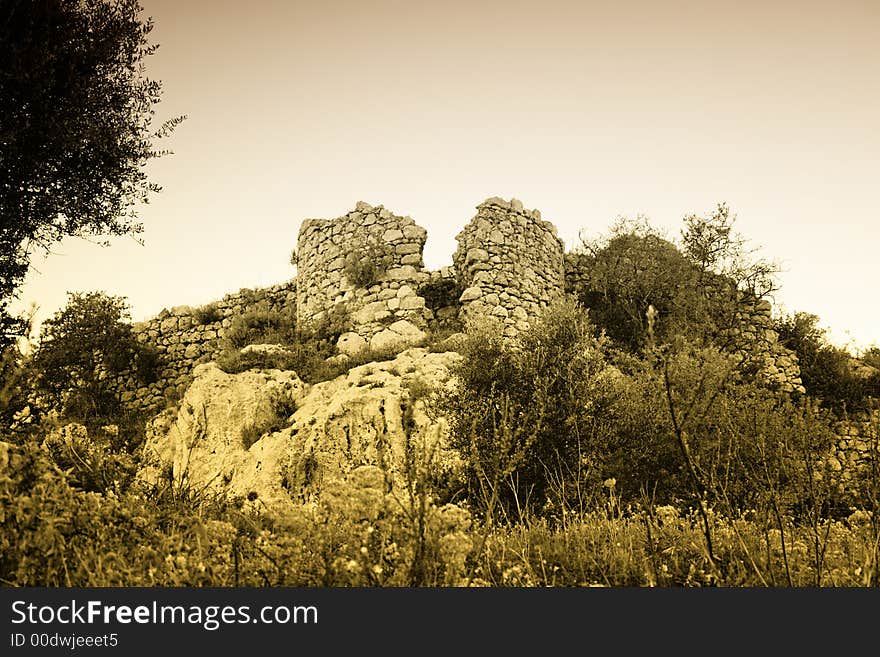 Ruin of the ancient fortress byzantine, visible the tower. Sicilian Landscape.