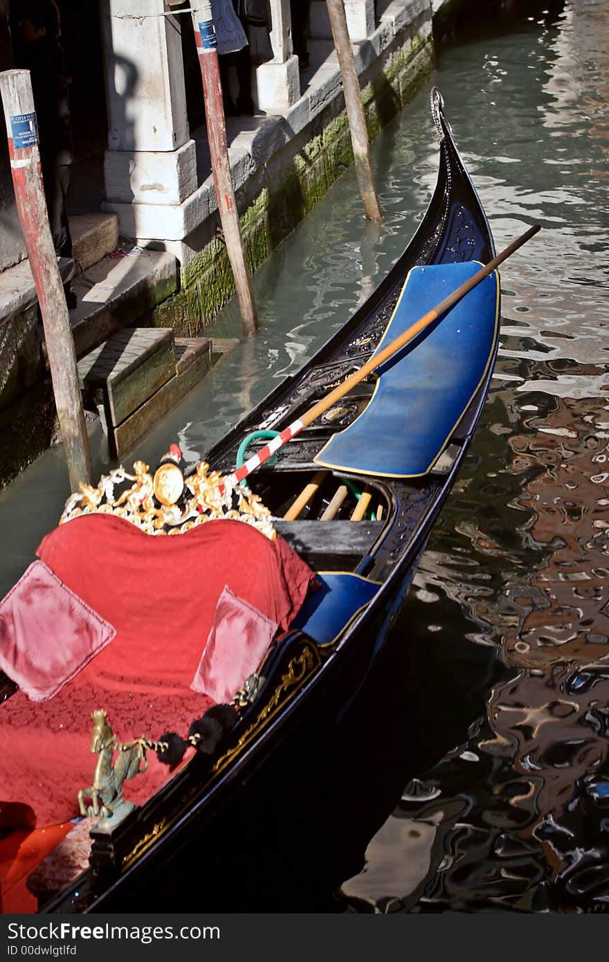 Gondola boat on one of many canals in venice. Gondola boat on one of many canals in venice