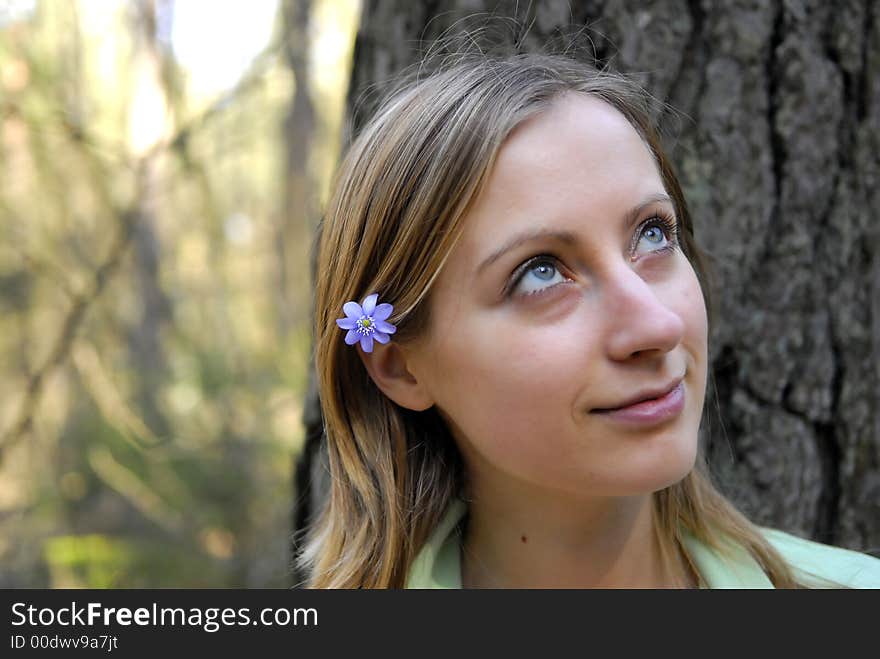 Young woman in forest