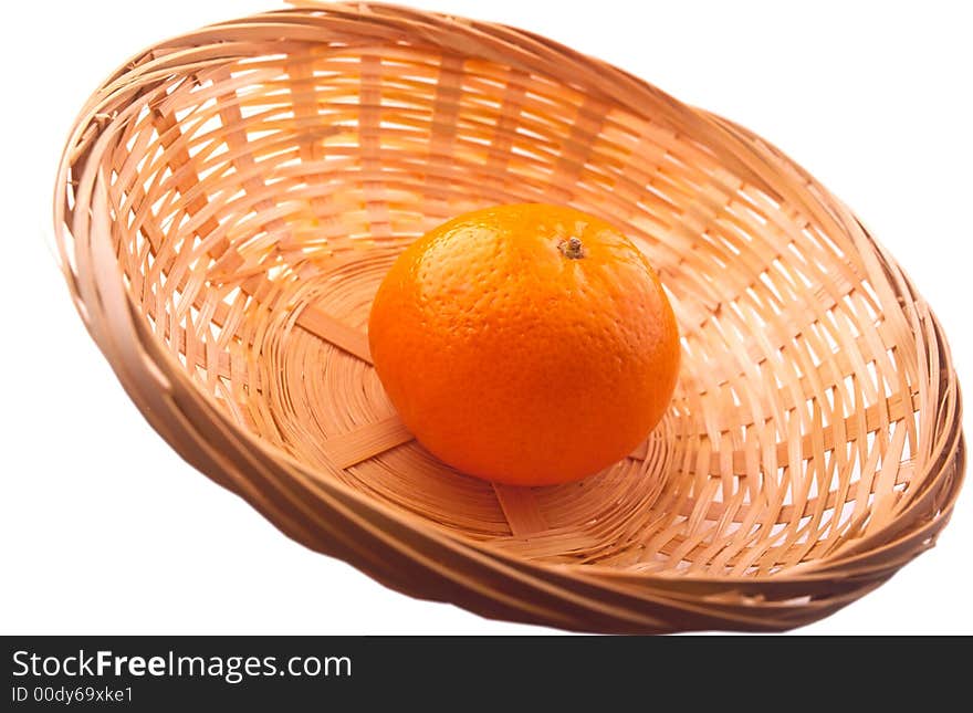 Tangerine in wum plate on white background. Tangerine in wum plate on white background