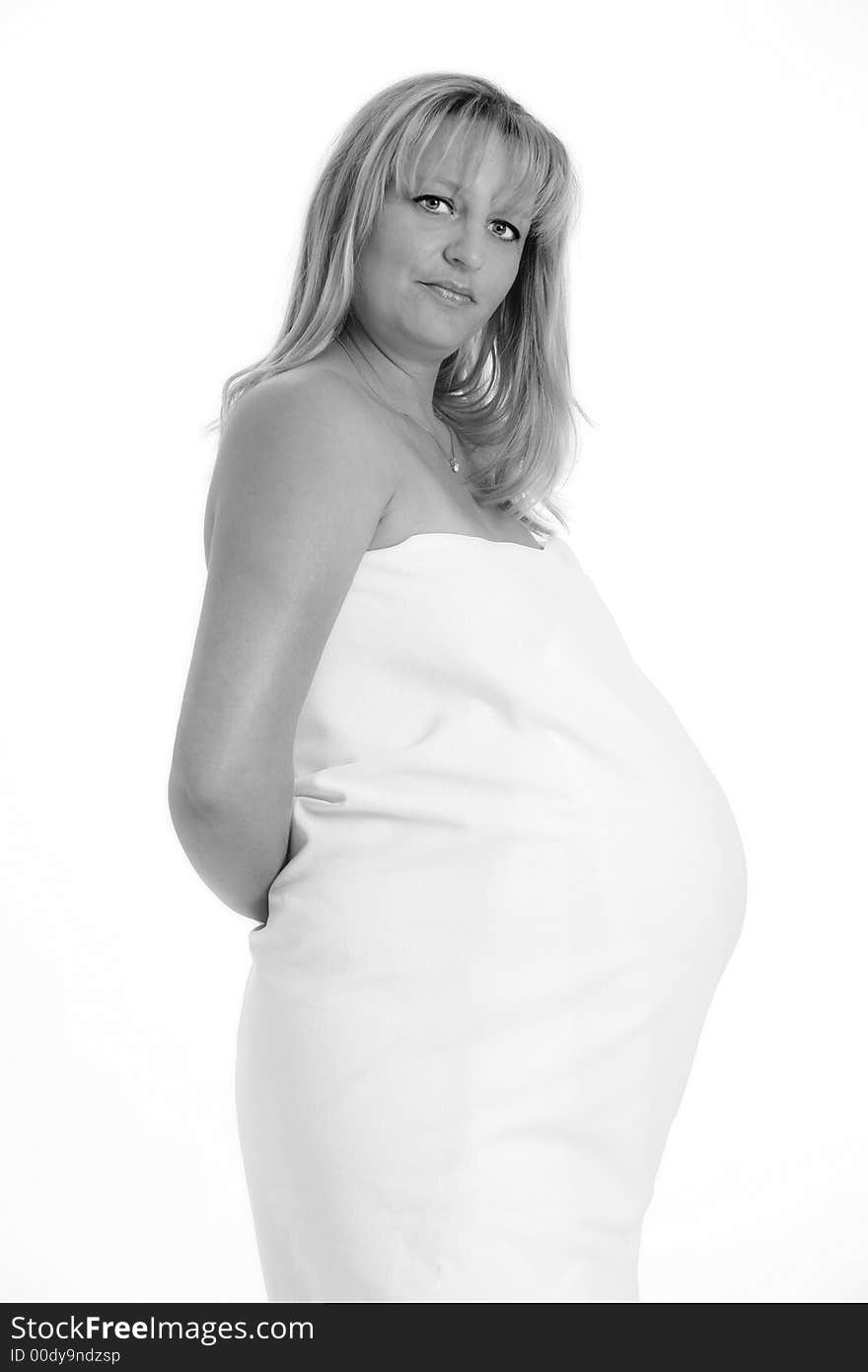 Mother sitting on a white backdrop covered in a white sheet 6. Mother sitting on a white backdrop covered in a white sheet 6