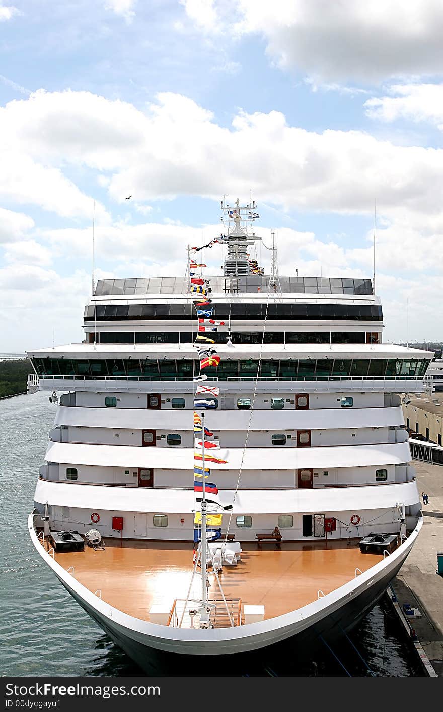 Modern cruise ship anchored at a dock. Modern cruise ship anchored at a dock