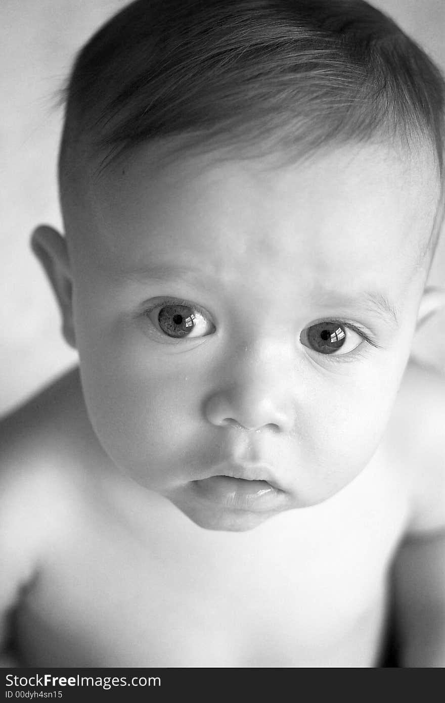 Black and white image of beautiful 10 month old baby boy. Black and white image of beautiful 10 month old baby boy