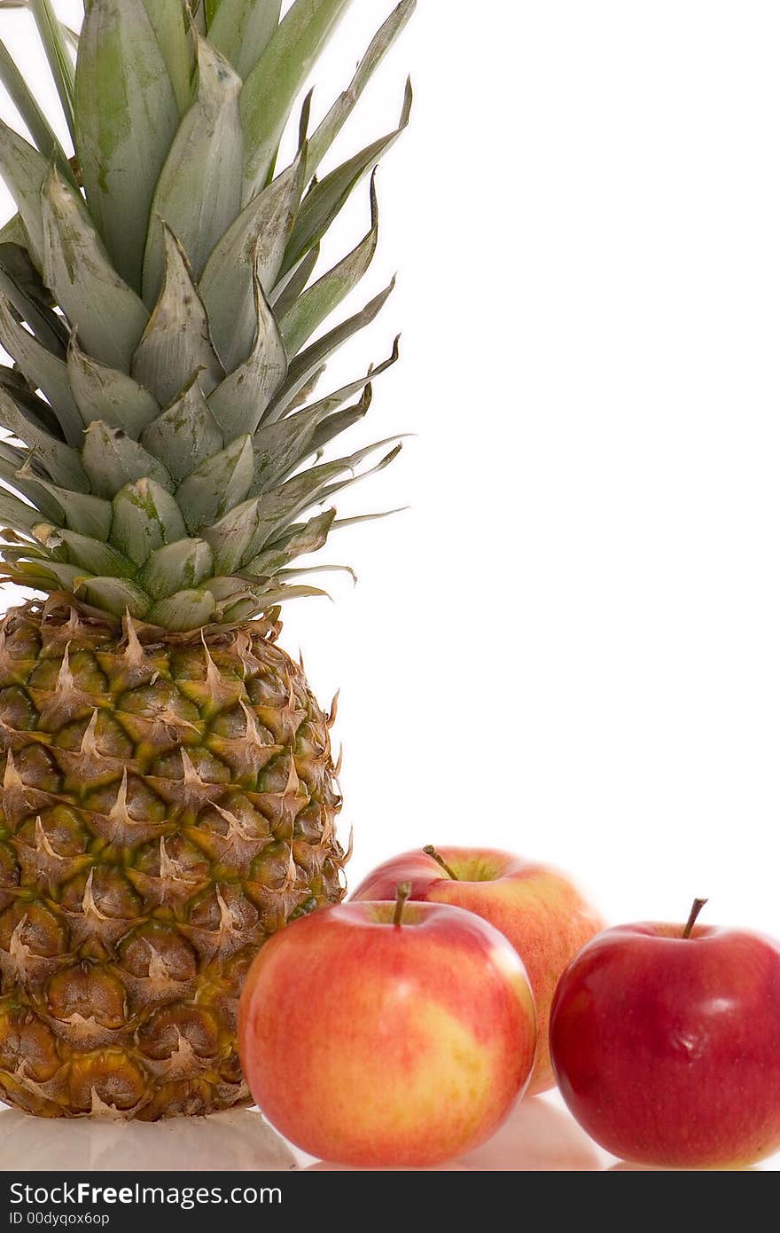 Fresh apples and pineapple - isolated over white. Fresh apples and pineapple - isolated over white