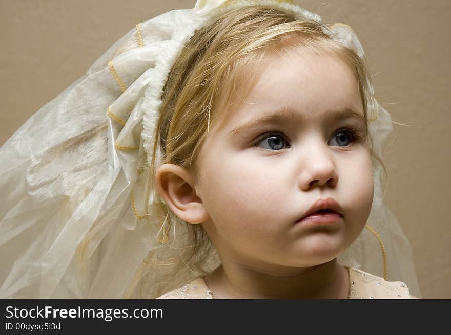 Infant With Veil On Head