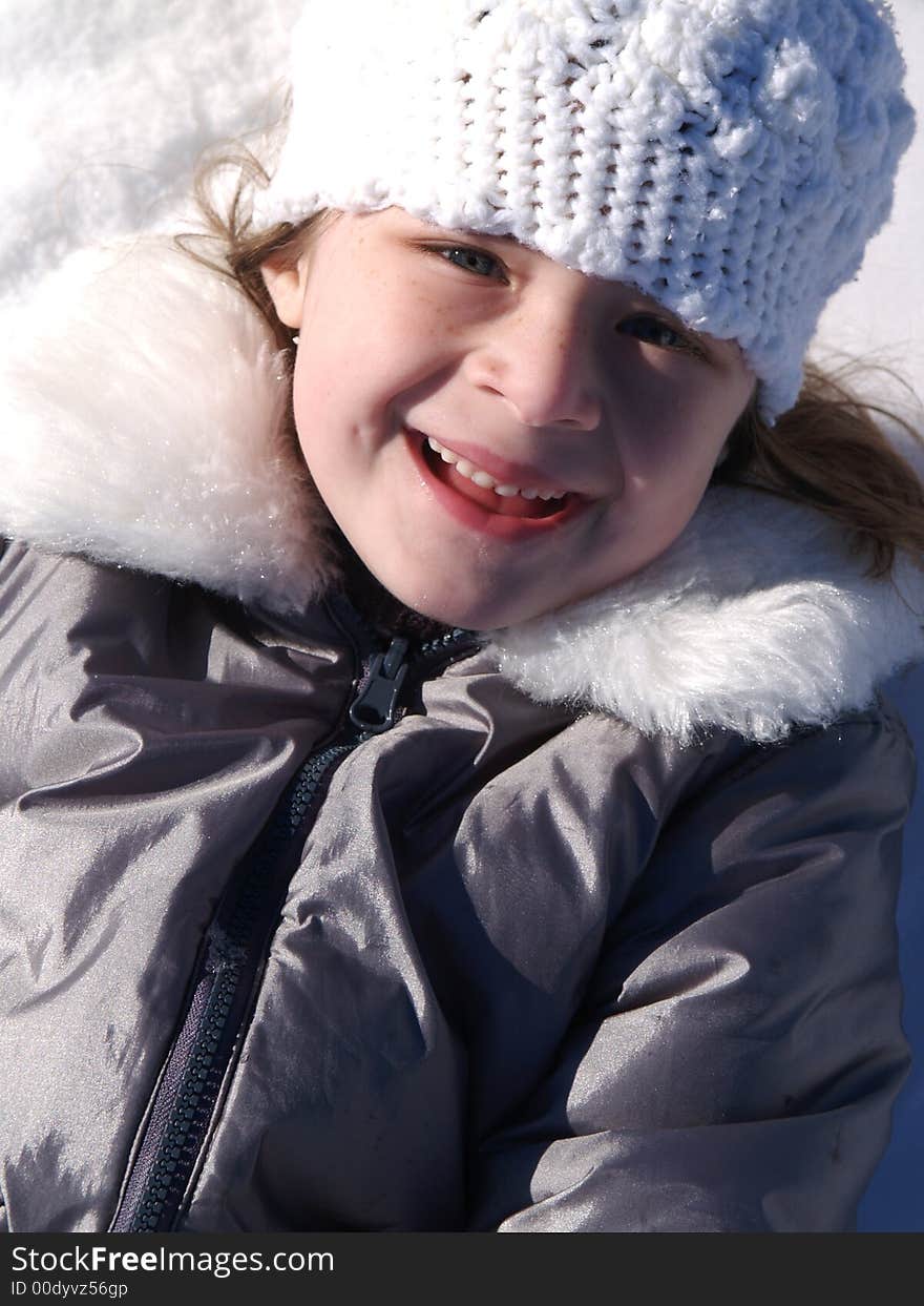 Adorable girl with winter hat and coat. Adorable girl with winter hat and coat