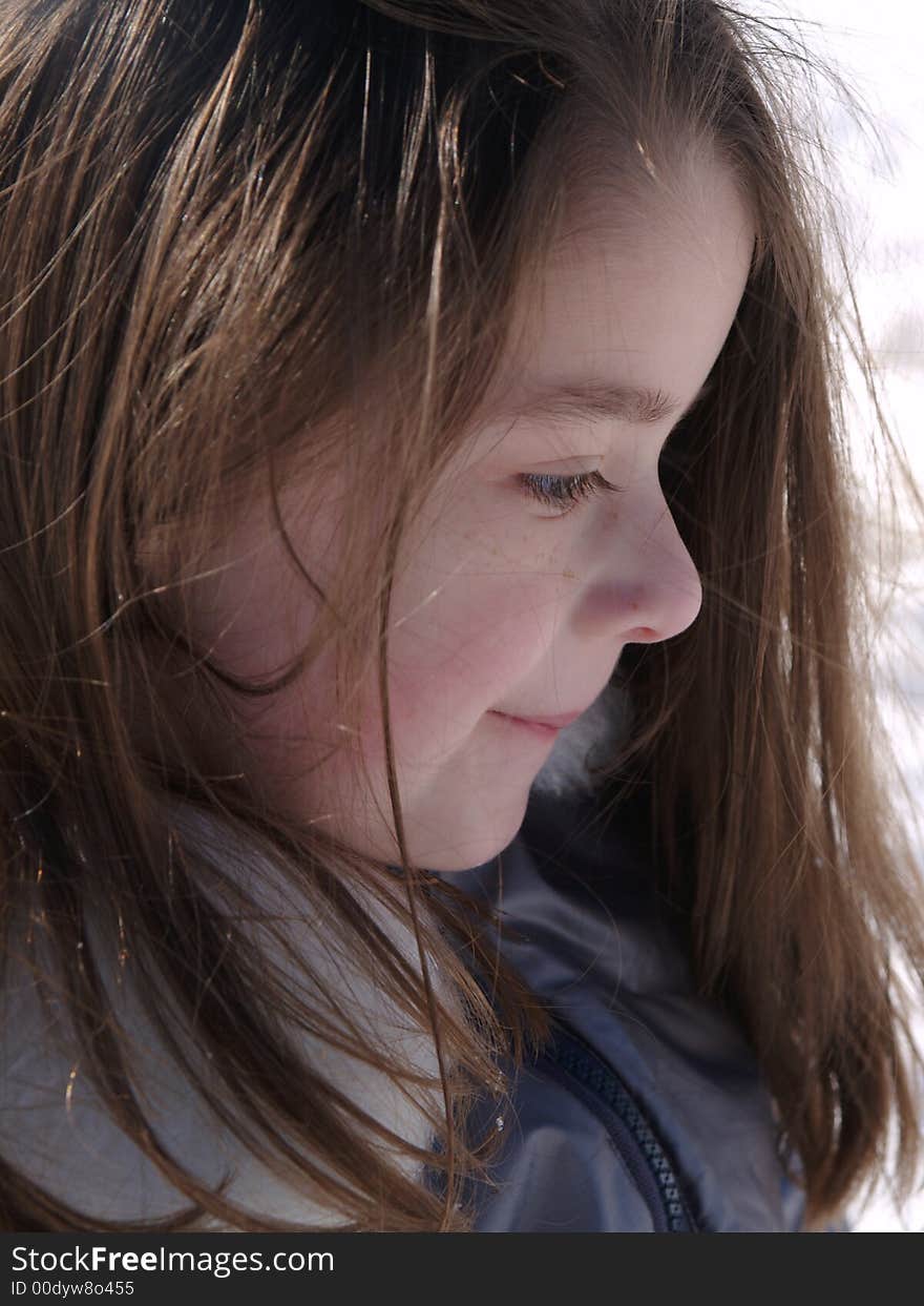 Profile of an adorable girl with messy hair. Profile of an adorable girl with messy hair