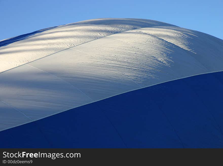 Crop of an hot air balloon being filled. Crop of an hot air balloon being filled