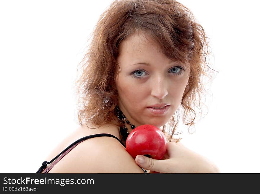 Girl with an apple on a white background