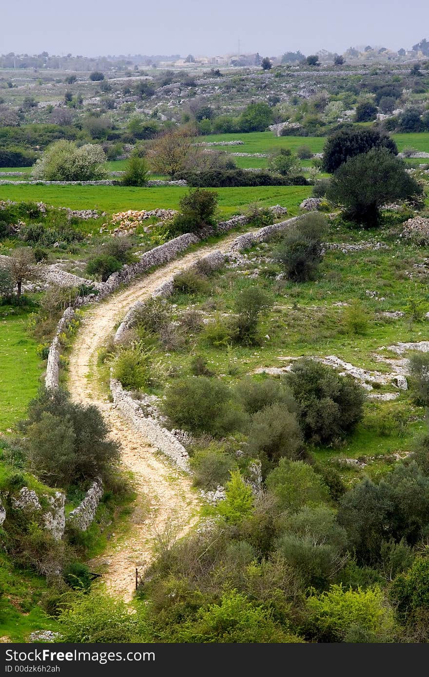 The sicilian landscape, characteristic country street in the hinterland. The sicilian landscape, characteristic country street in the hinterland