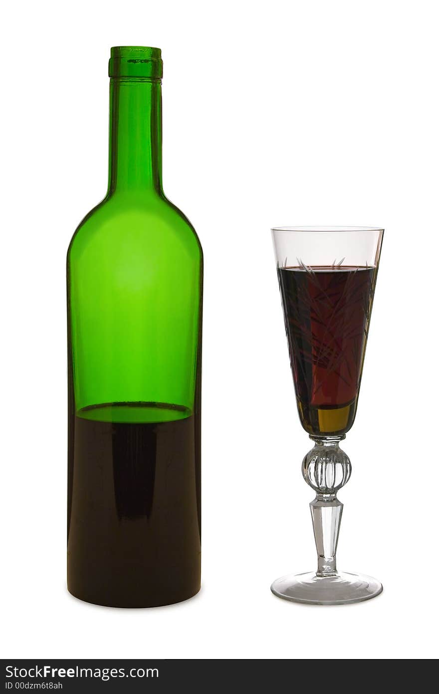 Glass With Red Wine And Bottle