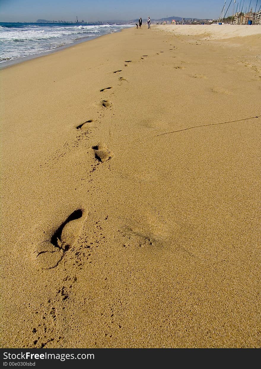 Human tracks on the sand of a beach. Human tracks on the sand of a beach