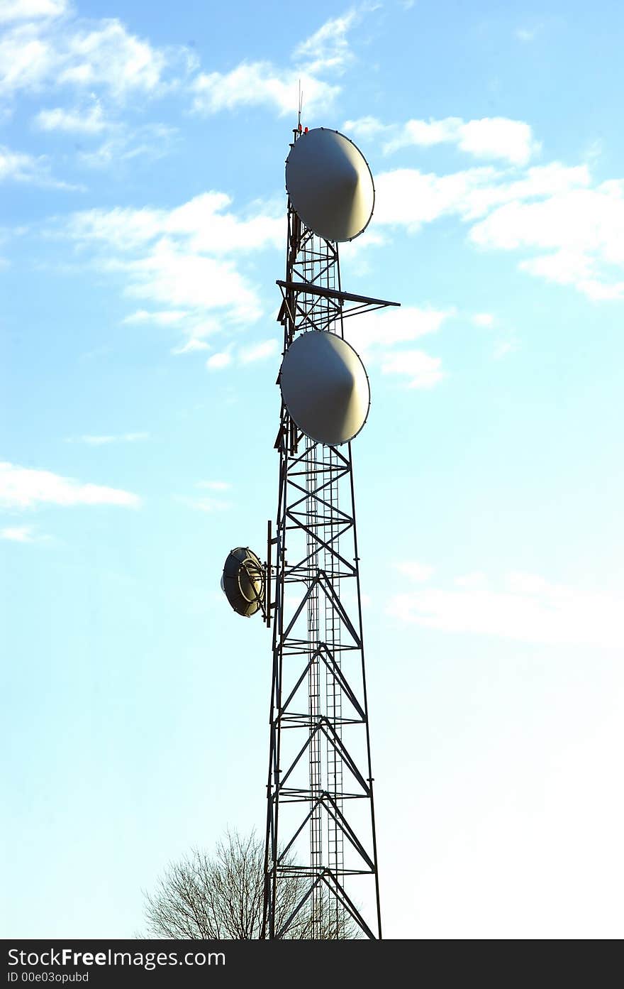 Communication tower on a bright sunny day