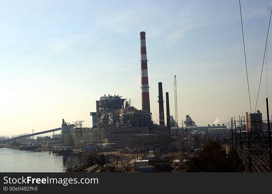 A power plant on a sunny afternoon. A power plant on a sunny afternoon