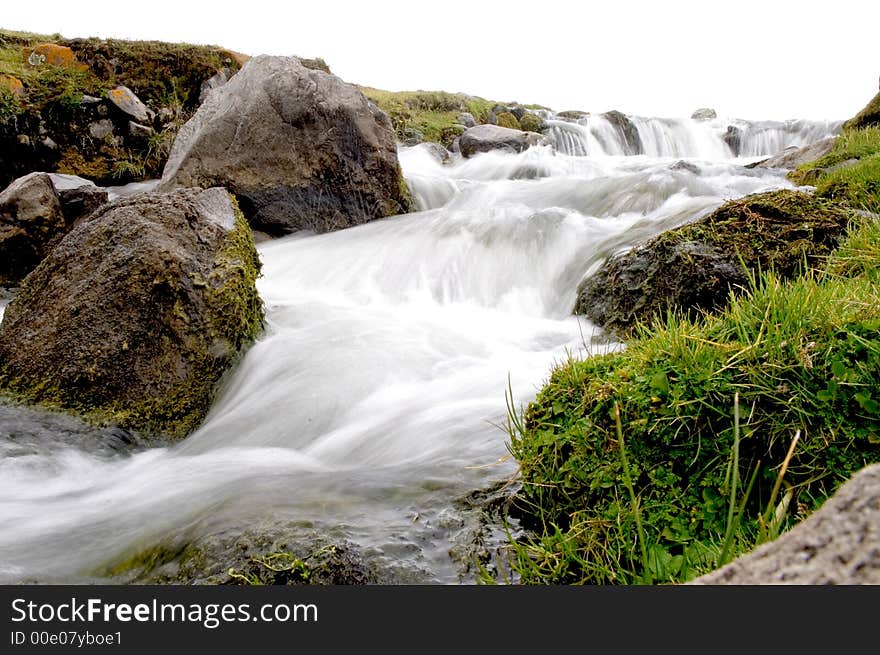 Highland waterfall and some rocks. Highland waterfall and some rocks