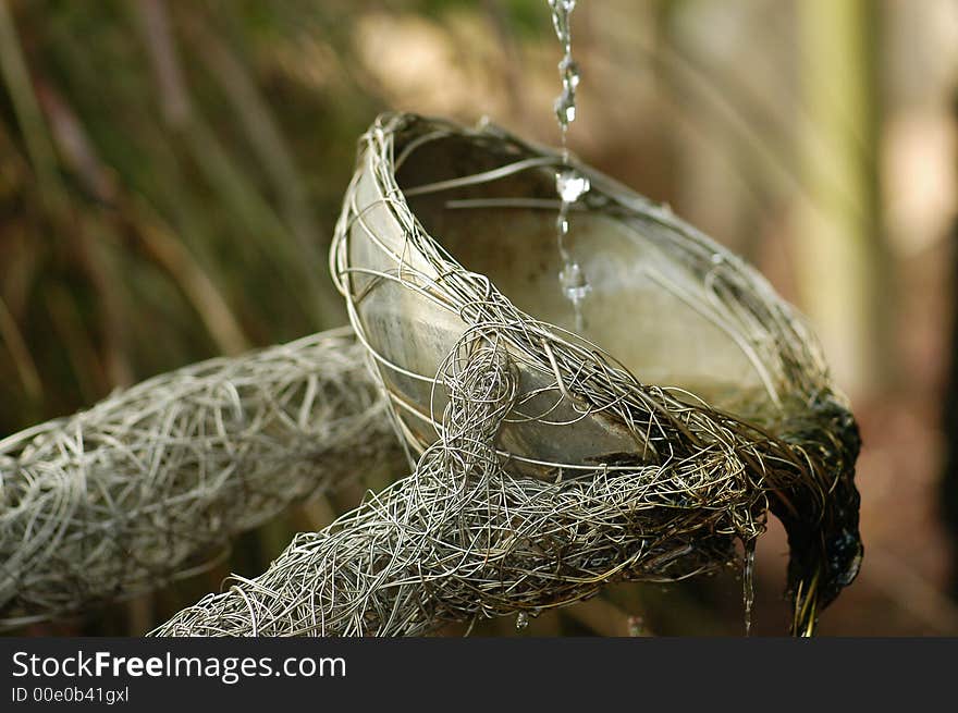 A bowl and water in the parks. A bowl and water in the parks