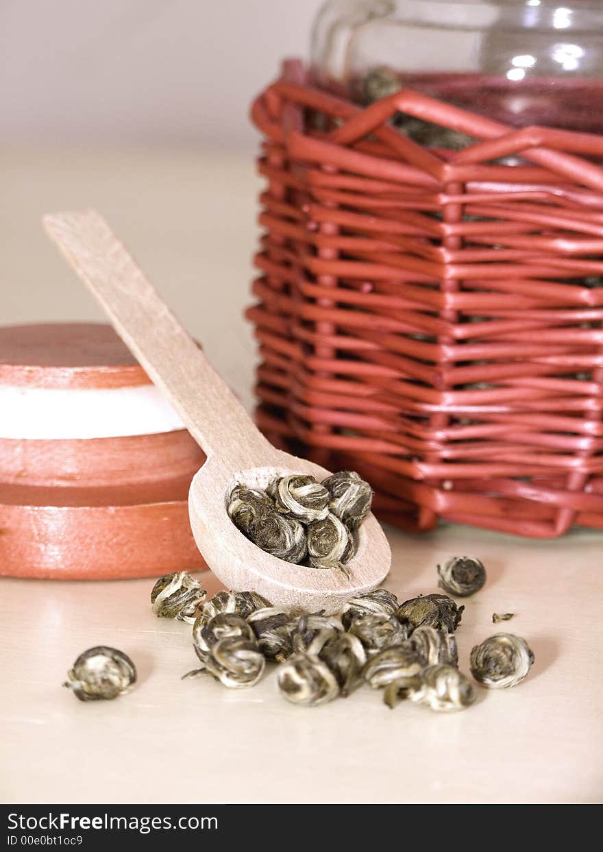 Jasmine green tea called Dragon Tears. With bamboo tea strainer.