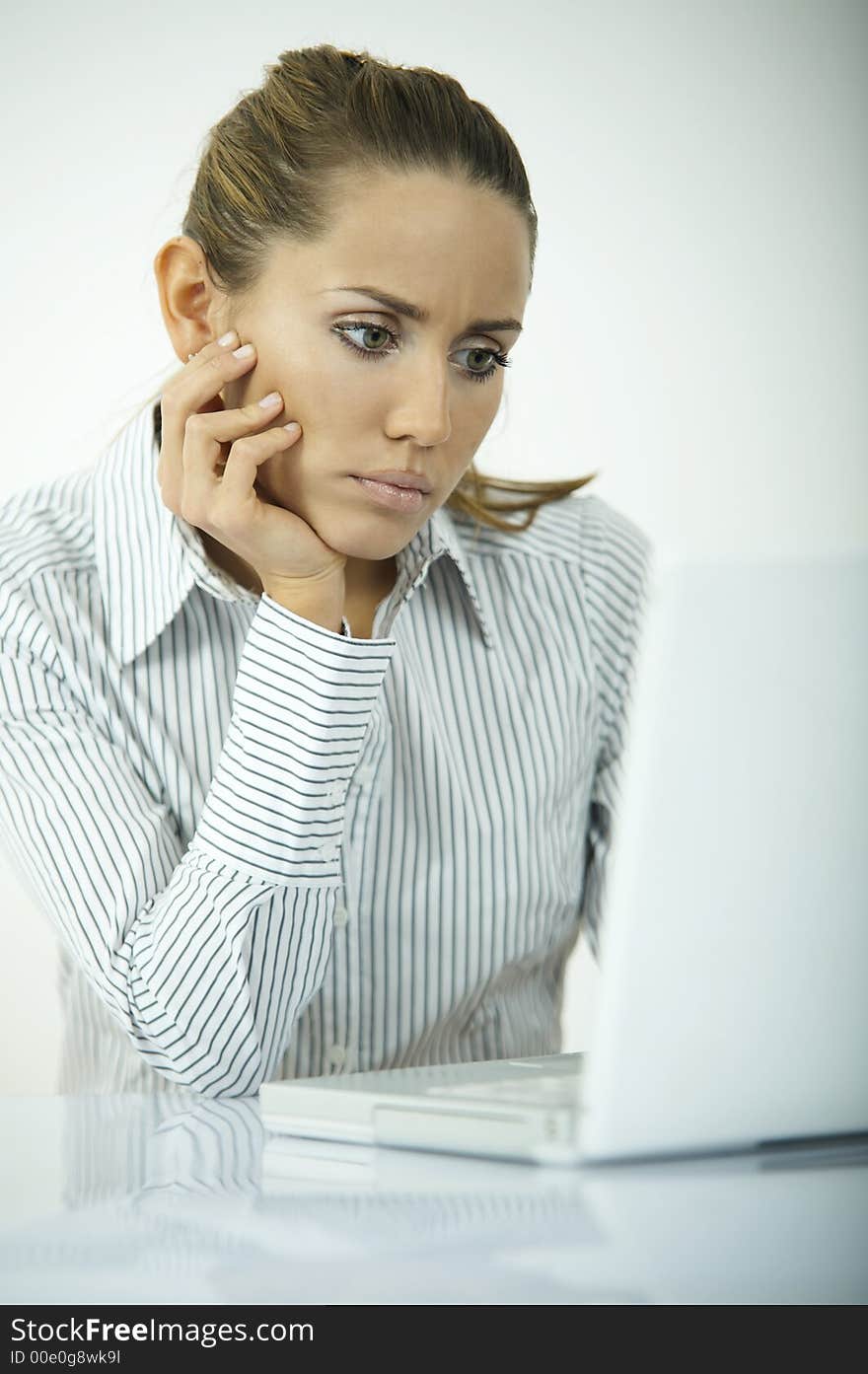 Beautiful business woman during daily office routines. Beautiful business woman during daily office routines