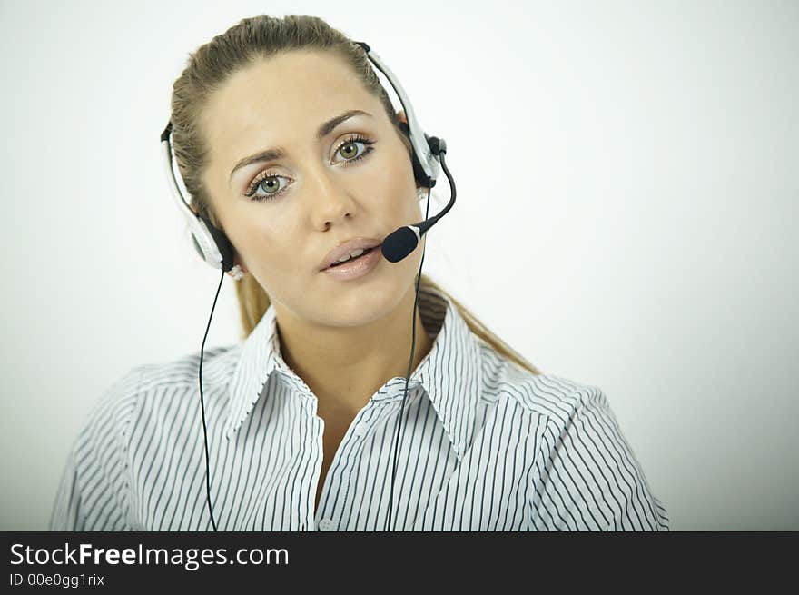 Beautiful business woman during daily office routines. Beautiful business woman during daily office routines