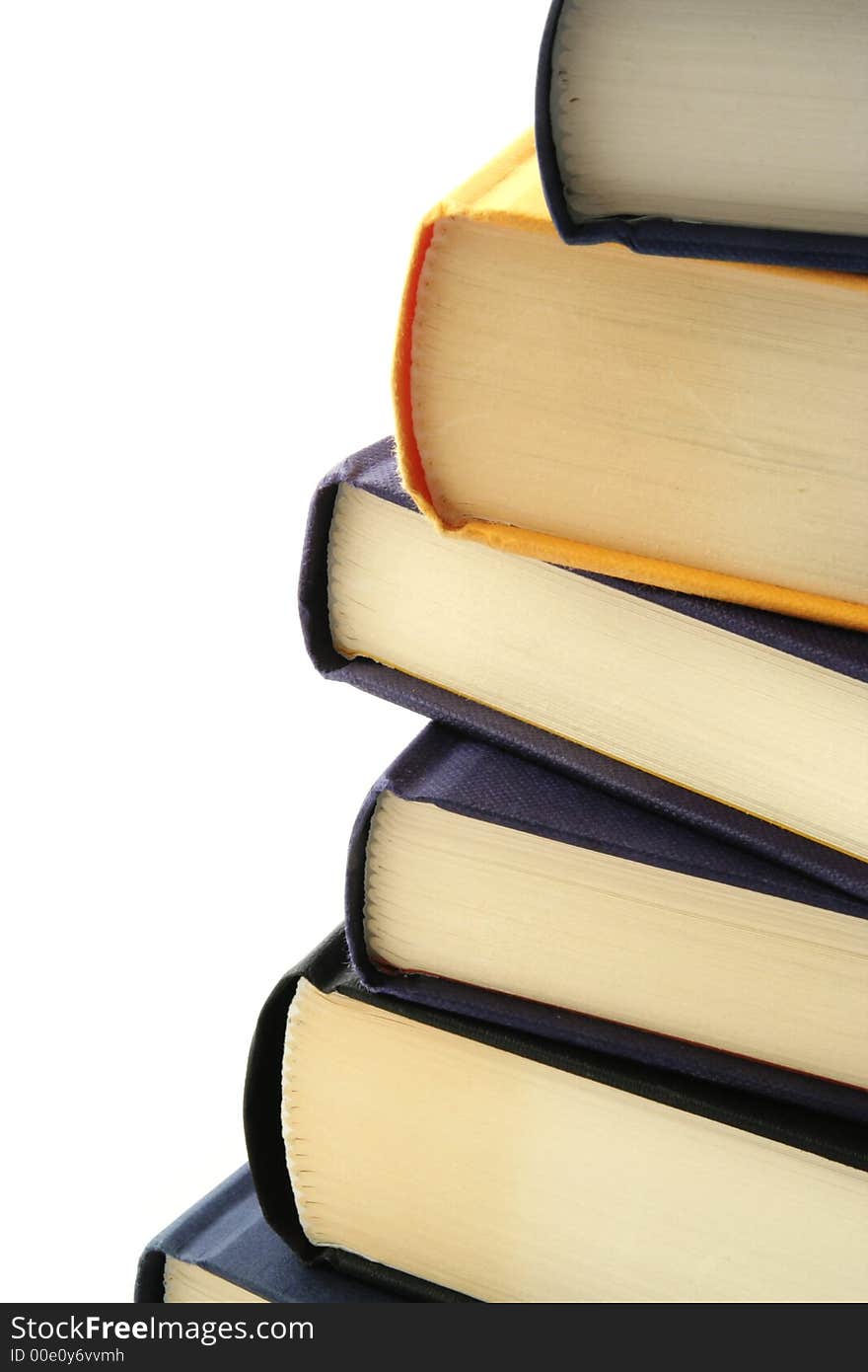 Stack of books against a white background