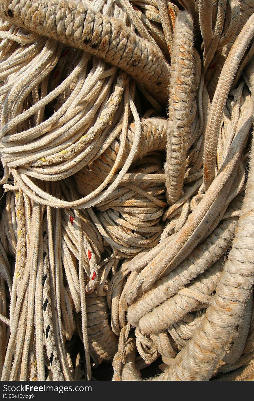 Detail of entangled ropes lying in a heap