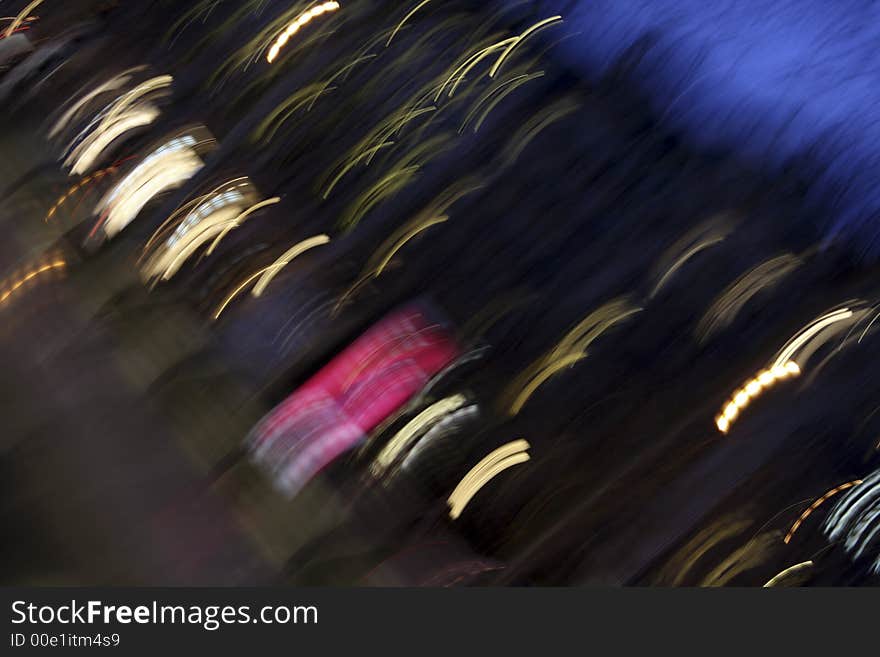 In Paris the Champs Elysees and cars in a blur. In Paris the Champs Elysees and cars in a blur