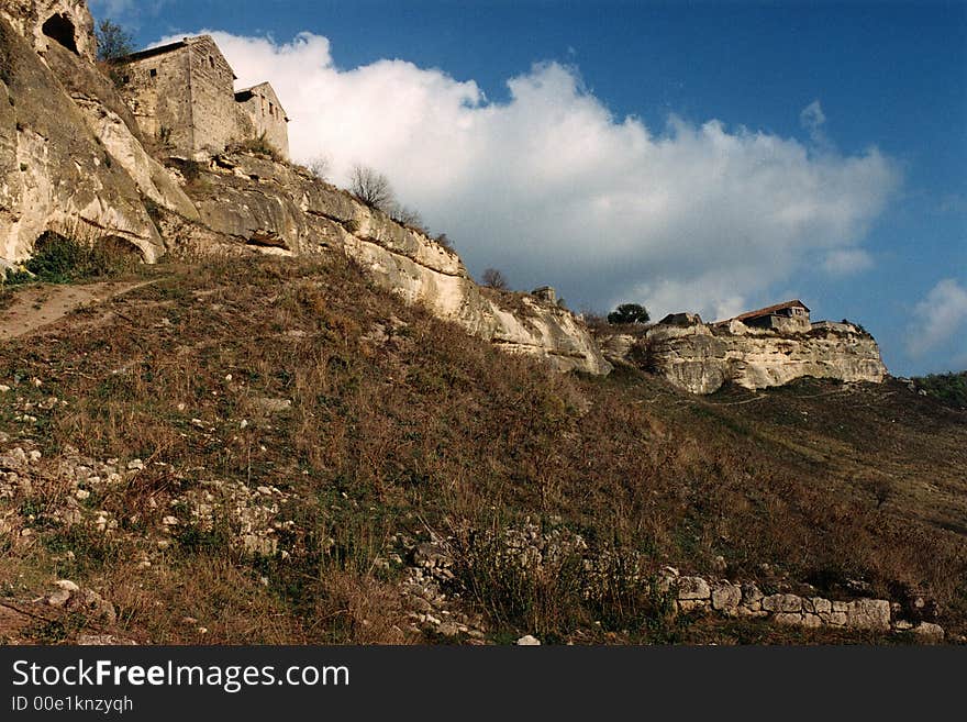 Old city on the high mountain, protected by breakages and walls