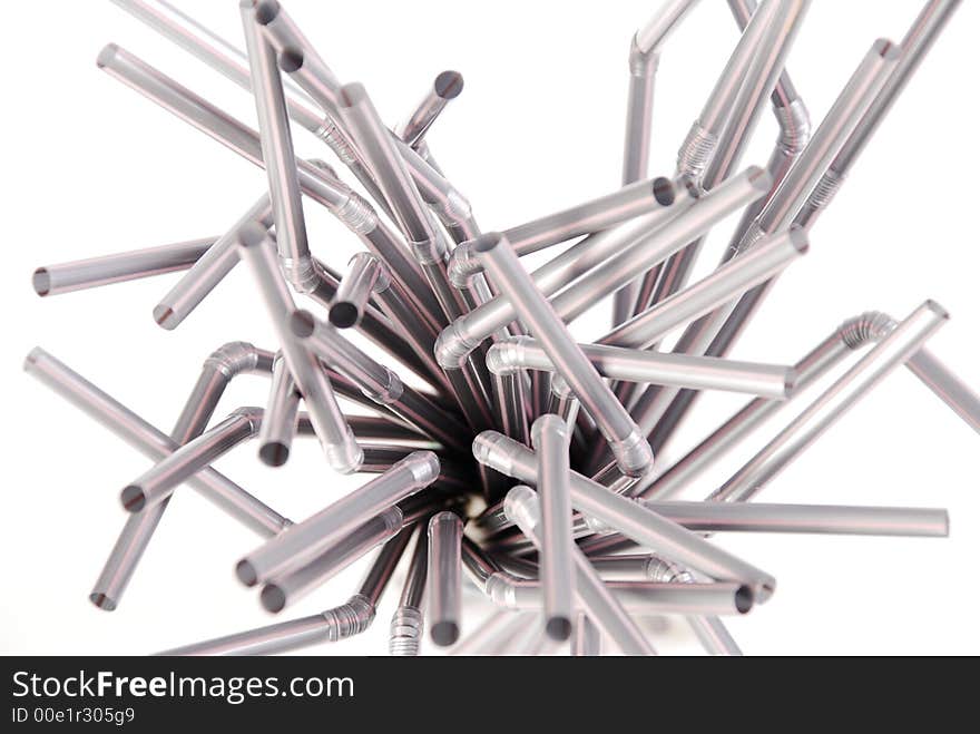 A composition made from silver sippers shot on white background. A composition made from silver sippers shot on white background