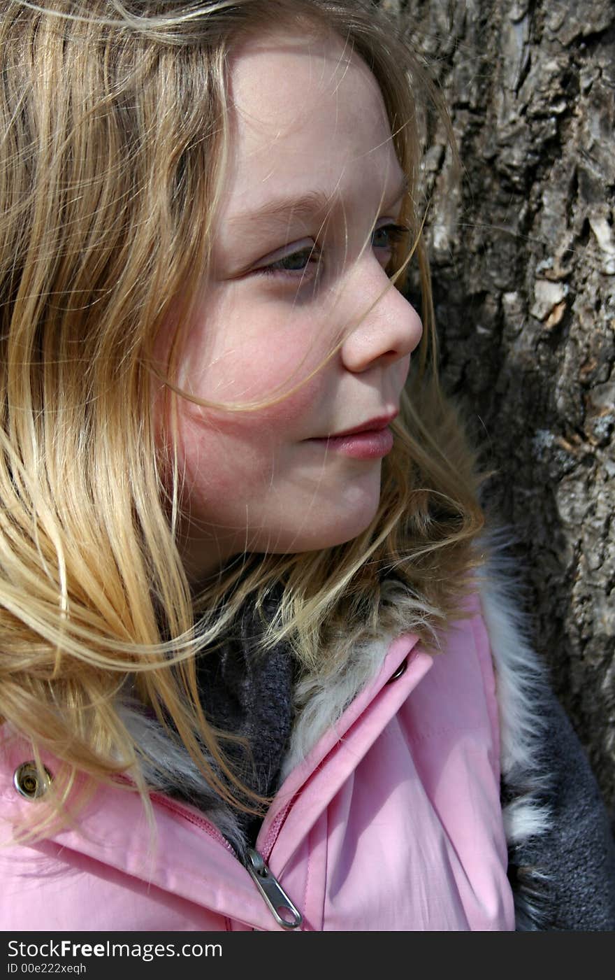 Girl Against a Tree