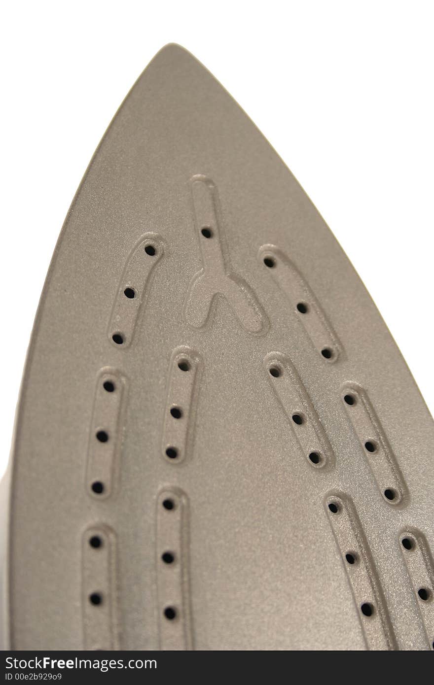 An image of the bottom of a iron. An image of the bottom of a iron