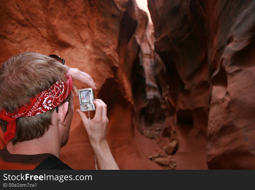 taking photos in a dark canyon