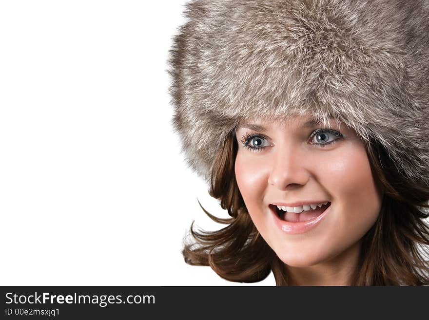 Portrait of a white beautiful woman in a fur hat. Portrait of a white beautiful woman in a fur hat