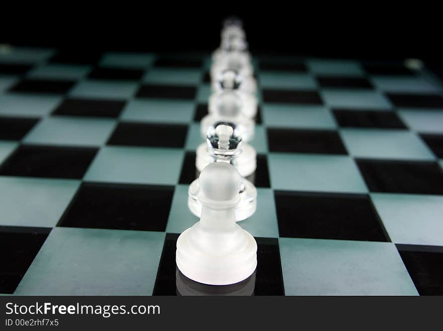 Chess Pieces on a glass board