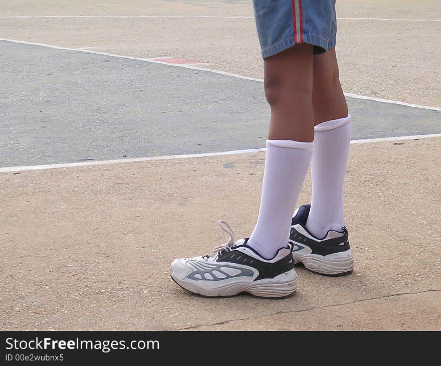 Side profile of a boy's legs. Side profile of a boy's legs