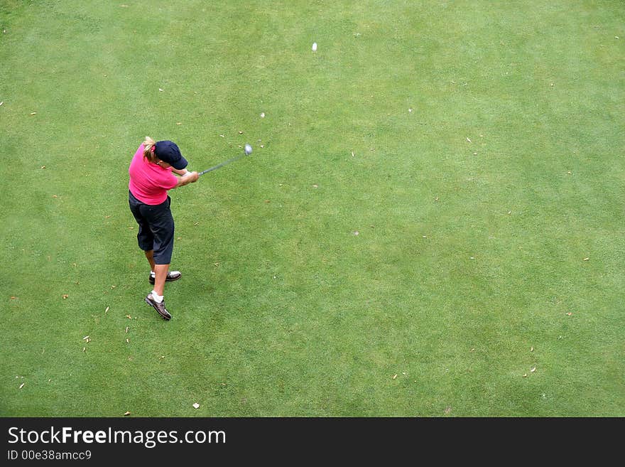 Lady golf swing in evian