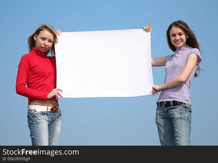 Girls with blank card for text. Girls with blank card for text