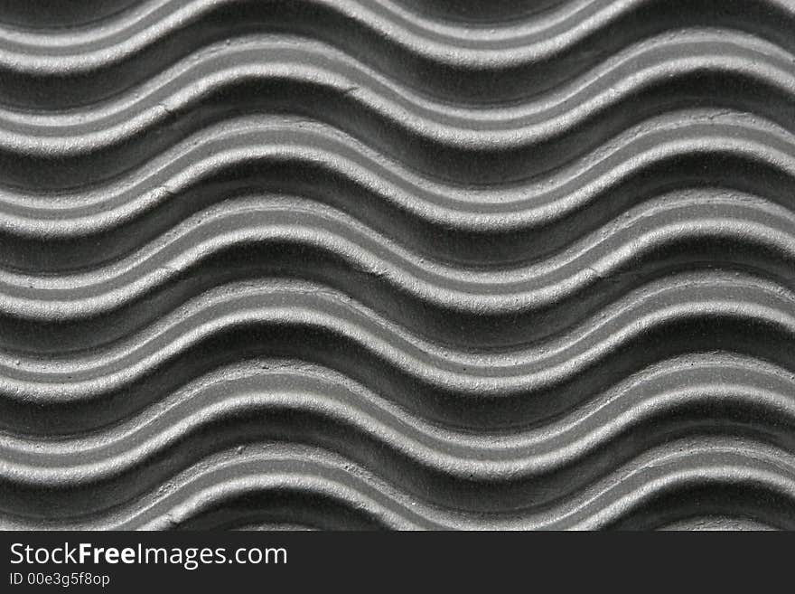 A macro shot of a curvy silver paper, great for backgrounds. A macro shot of a curvy silver paper, great for backgrounds