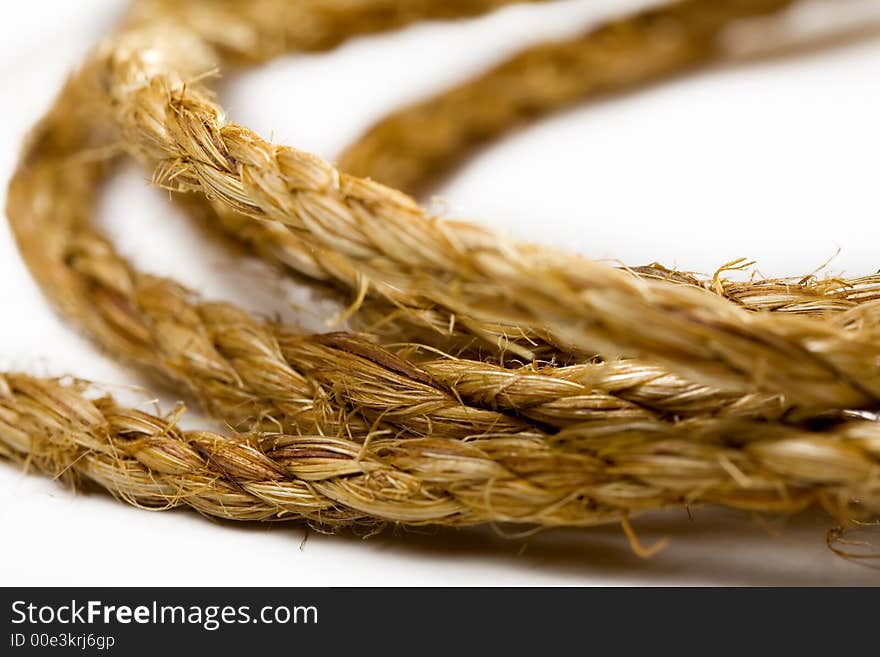 Close-up shot of a rope. Isolated white background