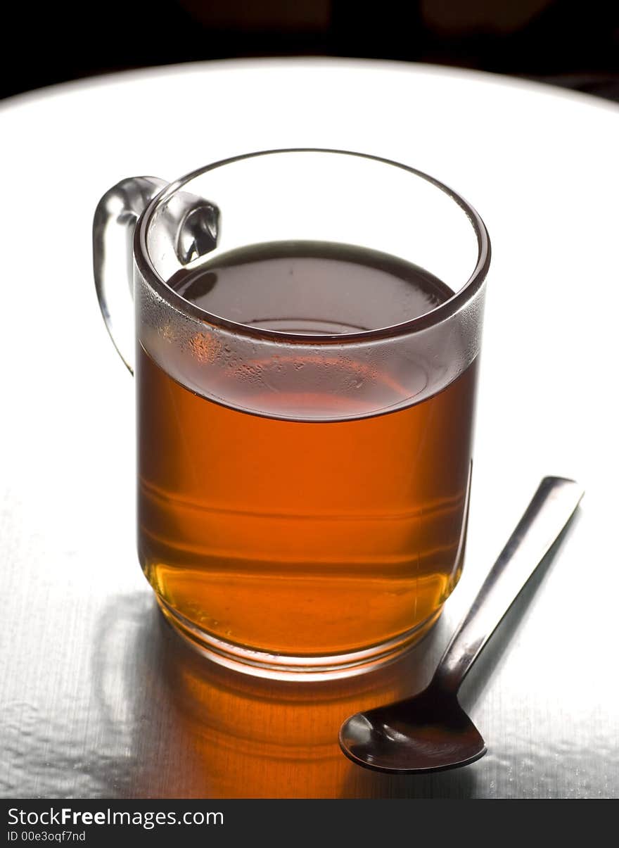 Clear Tea backlit on a white background